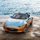 Illustration for article titled Placate Your Fears Of Global Economic Collapse With This Two-Tone Miata With A Denim Interior